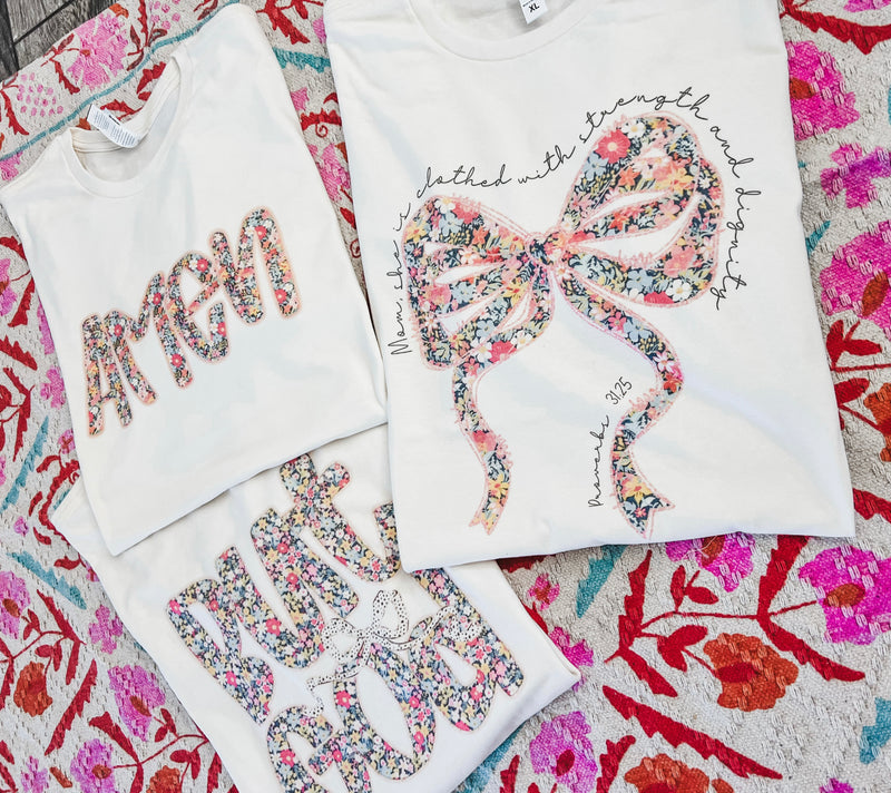 Floral Godly cream tees