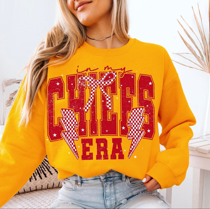 In my Chiefs era - golden yellow sweatshirt