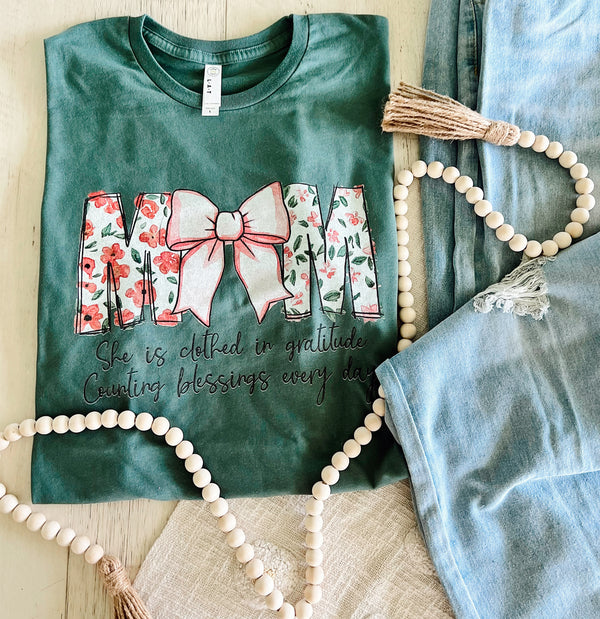 M🎀M - she is clothed in gratitude tee