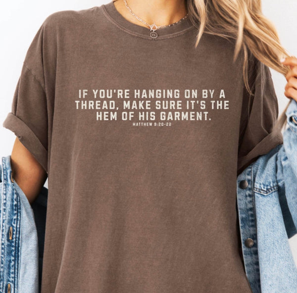 Hanging by the hem of His garment tee