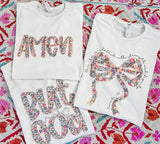Floral Godly cream tees