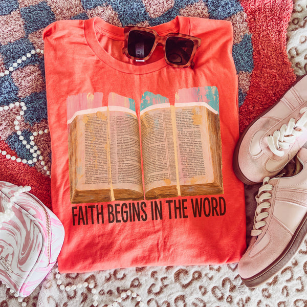 Faith begins in the world coral tee
