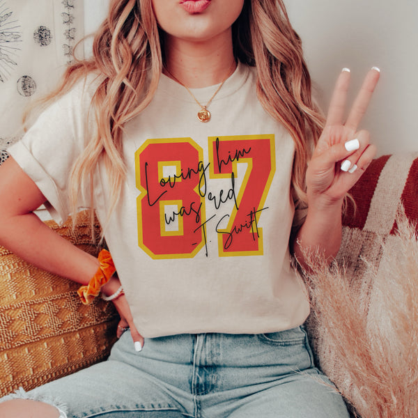 Loving him was red tee
