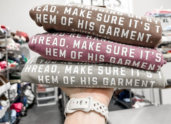 Hanging by the hem of His garment tee