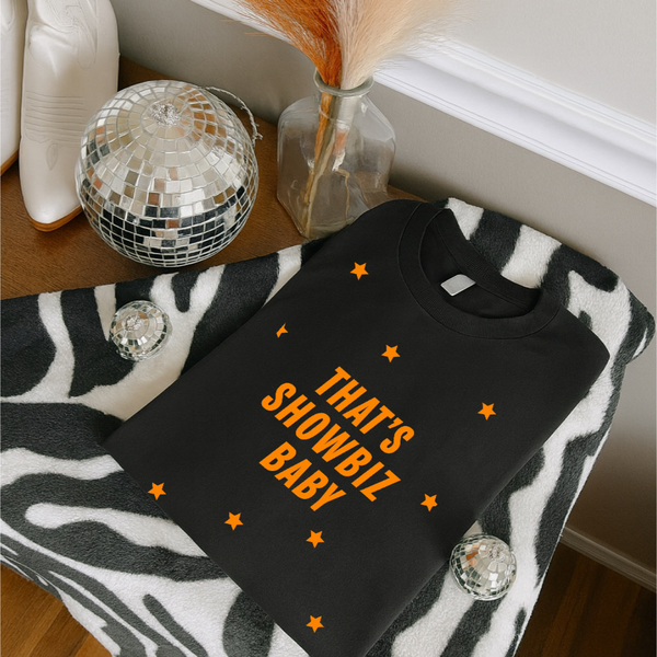 That's showbiz baby tee