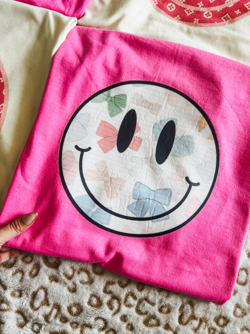 Bow smiley pink tee (adult and youth)