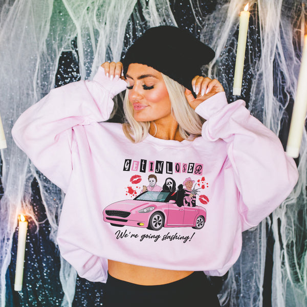 Get in loser, we’re going slashing sweater
