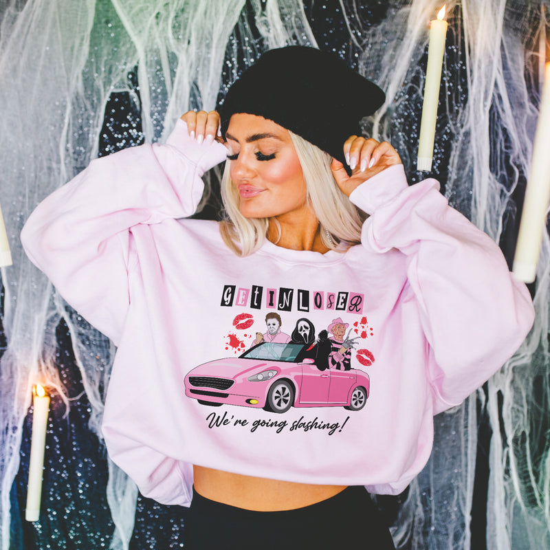 Get in loser, we’re going slashing sweater