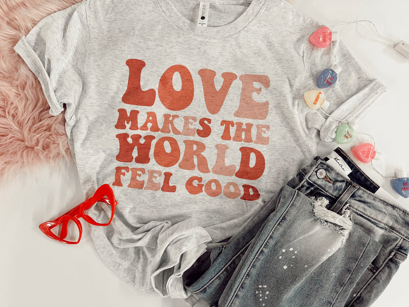 Love makes the world feel good tee