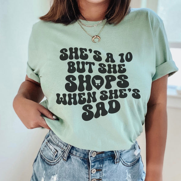 She’s a 10 but she shops when she’s sad tee