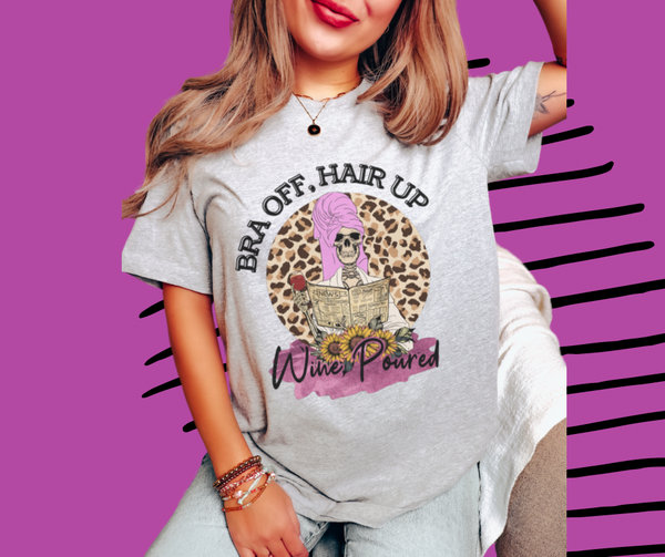 Bra off, hair up, wine poured tee